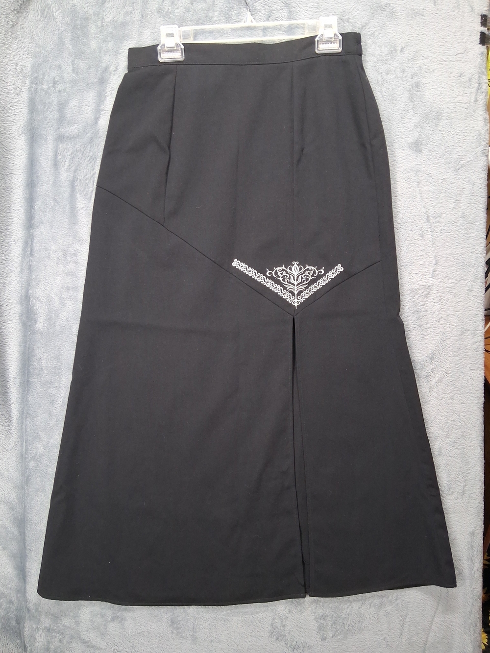 Elegant Black Maxi Skirt with Subtle Embroidered Accent & Front Vent
